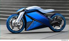 a futuristic blue and white motorcycle parked on the street