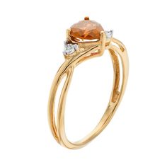 A heart-shaped citrine gemstone serves as the focal point to this beautiful ring, while shimmering diamond accents add eye-catching style. Click on this JEWELRY & WATCHES GUIDE to learn about fit, styles, materials and more!RING DETAILS Width: 6.5 mm Metal: 10k gold Packaging: boxed STONE DETAILS Stone type: citrine Total weight: 5/8 ct. Center stone size: 6 mm Shape: heart Setting: prong DIAMOND DETAILS Total weight: less than 1/10 ct. Shape: single cut Setting: illusion Gemstones may have been Elegant Orange Rings With Gemstone Accents, Elegant Amber Birthstone Ring, Gold Heart Cut Diamond Ring With Accent Stones, Gold Diamond Heart Cut Ring With Accent Stones, Elegant Heart Shaped Topaz Gemstone Ring, Elegant Heart-shaped Topaz Gemstone Ring, Anniversary Orange Rings With Gemstone Accents, Elegant Amber Rings With Gemstone Accents, Anniversary Topaz Birthstone Ring With Gemstone Accents