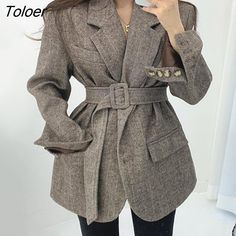 Shipping: Worldwide Express Shipping AvailableDelivery time: 7-15Days Fast ShippingReturns: Fast refund, 100% Money Back Guarantee.Brand Name: SIXTEEN STREETAge: 25-34Style: Office LadyClothing Length: RegularOrigin: Mainland ChinaCN: GuangdongMaterial: WoolMaterial: PolyesterDecoration: PocketsDecoration: BeltMaterial Composition: high qualityPattern Type: stripedRelease Date: FW2022Season: Autumn/WinterModel Number: wool jacket ladies fallCollar: Turn-down CollarClosure Type: Single BreastedSl Fall Khaki Blazer With Pockets, Winter Office Khaki Blazer, Khaki Fall Office Blazer, Khaki Office Blazer For Fall, Fall Office Khaki Blazer, Trendy Long Sleeve Khaki Blazer, Boho Winter Coat, Coat For Woman, Suits Korean