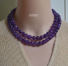 "Making Technics: Full Handmade necklace length: can choose Purple Amethyst size:10mm Item details: Natural Purple Amethyst Necklace,16-17\"purple amethyst necklace,February Birthstone Necklace,AmethystJewelry,ChristmasGift,10mm Purple Amethyst Necklace,Gemstone Necklace Materials: - faceted real Purple Amethyst10mm bead   This necklace is the Perfect Gift for people you love and care about!" Luxury Elegant Amethyst Beaded Necklaces, February Birthstone Necklace, Necklace Birthstone, Necklace Gemstone, February Birthstone, Wedding Jewellery Necklace, Amethyst Necklace, February Birth Stone, Birthstone Necklace