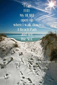 the path to the beach is covered in white sand