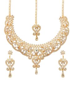 PRICES MAY VARY. NEW! Touchstone Indian Bollywood Choice Rich Traditional Exclusive Floral Workmanship Sparkling Rhinestone Grand Bridal Designer Jewelry Necklace Set In Gold Tone For Women. Extra Long Earrings: Length: 2.30 Inches. Specifications: Necklace Circumference 15 Inches. Extendable/Adjustable With Extra Links/Chain Up To 20 Inches. Earring Weight (Single) 7 Gms. Earring Length 2.30 Inches. Earring Width 0.75 Inch. Mangtika Length 6.50 Inches. OCCASION Will add luster when worn for a w Bollywood Style Gold Jeweled Jewelry Sets, Gold Crystal Jewelry Sets With Stone Work, Gold Kundan Necklace With Crystal Stone Work, Gold Jewelry Sets With Stone Work For Eid, Festive Gold Crystal Jewelry Sets, Traditional Gold Crystal Jewelry Sets, Bridal Maang Tikka, Indian Jewelry Set, Extra Long Earrings