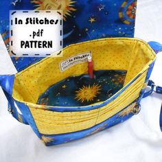 a blue and yellow bag with stars on it