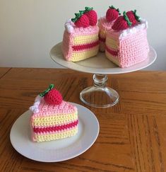 two pieces of cake sitting on top of plates