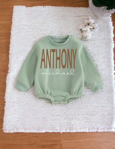 "Personalized green sweatshirt with first and middle name for coming home outfit, birthday, holiday, photo session, etc.    Don't forget to add to your Babylist baby shower gift registry! OVERVIEW ⭐️ Allow 1-3 days for items to be made and put in the mail, up to 3-5 days for customized outfits ⭐️ See all images within this listing for options ⭐️ Monogrammed outfits are made using a vinyl transfer, not embroidered. ⭐️ These outfits make great baby shower gifts, newborn coming home outfit, 1st birthday and 2nd birthday outfits for your baby boy or baby girl.   ⭐️ Most items should be hand washed and laid flat to dry. ⭐️ Contact me with any questions.   PERSONALIZATION ⭐️ Please leave all information needed for personalization. Failure to do this may delay your shipment.   ⭐️ Personalized hat Cute Green Sweatshirt With Letter Print, Customizable Long Sleeve Green Sweatshirt, Customizable Green Long Sleeve Sweatshirt, First Birthday Green Top With Letter Print, Hospital Clothes, Coming Home From Hospital, Holiday Photo Session, Clothes Green, Personalized Baby Hat