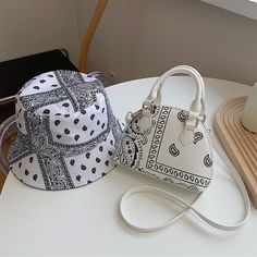 SPECIFICATIONSTypes of bags: Shoulder Crossbody BagsSupport: Wholesale and Drop ShippingStyle: FashionShape: ShellPlace Of Origin: HE BEI ProvincePattern Type: FloralOrigin: CN(Origin)Occasion: VersatileNumber of Handles/Straps: SingleModel Number: SH1577Main Material: PULining Material: PolyesterItem Type: HandbagsInterior: Cell Phone PocketHardness: SoftHandbags Type: Shoulder BagsGender: WOMENExterior: Solid BagClosure Type: zipperBrand Name: XotindSIZE:(Width)20cm * (Height)15cm * (Thickness Small Handbags For Women, Flower Bucket Hat, Fashion Bandana, Yellow Purses, Shell Bag, Purple Bag, Flower Bucket, Mens Travel Bag, Bag Summer