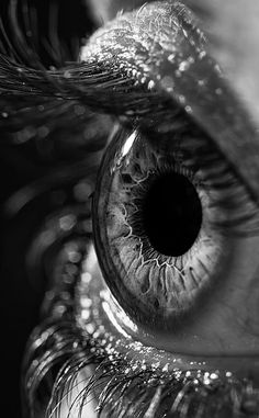 an eye is shown in black and white with the caption'visit saved '