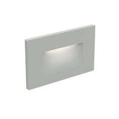 a white light that is on the side of a wall or ceiling mounted fixture with a dimmer