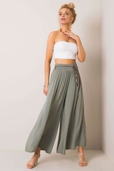 Indulge in the epitome of summer chic with our Sunny Daydream Wide-Leg Trousers! Crafted from luxurious viscose, these high-waisted pants promise both style and comfort for your sun-drenched escapades. Boasting a flattering elastic waistband, these trousers offer a dreamy fit that hugs your curves in all the right places. The wide legs cascade effortlessly, exuding an air of laid-back sophistication that's perfect for leisurely strolls along the beach or sipping cocktails by the poolside. Comple Bathrobe Men, Plus Size Pullover, Women Trousers, Waistband Pants, Elastic Waistband Pants, On Beach, Casual Trousers, Wide Legs, Tie Belt