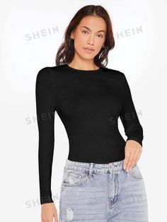 Fitted Long Sleeve T-shirt With Ribbed Neckline, Trendy High Stretch Long Sleeve T-shirt, Stretch Knit Top With Crew Neck, Solid Stretch Knit Top With Crew Neck, Stretch Long Sleeve Top With Crew Neck For Winter, Black Fine Knit Long Sleeve Tops, Black Long Sleeve Fine Knit Top, Basic High Stretch Tops For Fall, High Stretch Knit Sweater With Long Sleeves