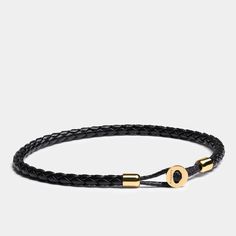 Braided leather bracelet with golden clasp - Men's minimalist Jewelry - Elegatto Uno Gold - Mothers Day gift 2021The Uno Gold is a classy bracelet of supreme quality. Chic, masculine, and rich, it is an ideal add-on accessory for any look.This bracelet features a single genuine leather strand tied with nylon string to add texture. It closes utilizing a round stainless steel round clasp with branded Elegatto engraving.It is the perfect birthday, anniversary, or Valentine's Day Gift For Him.This b Classic Leather Braided Bracelet Gift, Elegant Adjustable Leather Braided Bracelet, Rope Bracelets Diy, Luxury Leather Braided Men's Bracelet, Masculine Adjustable Braided Bracelets With Leather Strap, Men’s Braided Leather Bracelet, Bracelets For Boyfriend, Nautical Bracelet, Ideal Boyfriend