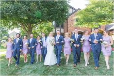 a bride and groom with their bridal party