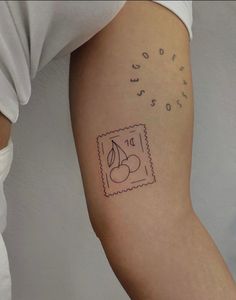 a person with a small tattoo on their arm