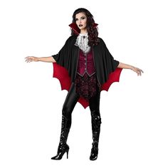 a woman dressed in a vampire costume