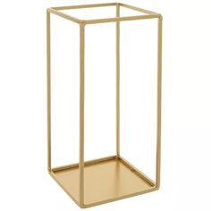 a gold metal shelf with a glass top and bottom section on the side, against a white background