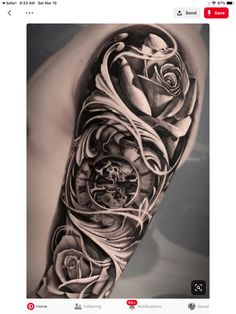 a man's arm with a clock and roses on it