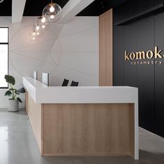 the front desk of komok's optometry in an office building