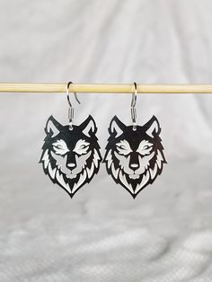 Intricately cut stainless steel wolf charms. Stainless steel Hooks Black Wolf Design Jewelry For Gift, Silver Wolf Design Stainless Steel Jewelry, Silver Stainless Steel Wolf Jewelry, Silver Stainless Steel Wolf Design Jewelry, Wolf Earrings, Crystal Gifts, Charms, Stainless Steel, Crystals