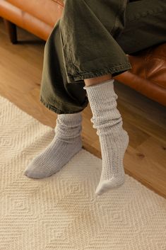 A necessary addition to your sock drawer, these so cozy and seriously soft socks are featured in a chunky, ribbed knit fabrication and slouchy silhouette with a seamed heel and toe. chunky ribbed knit slouchy seamed heel and toe Cozy Super Soft Socks For Fall, Cozy Knee-high Knit Socks, Comfortable Cozy Fall Socks, Comfy Cozy Fit Socks For Fall, Comfortable Socks For Fall, Comfortable Mid-calf Socks For Fall, Thick Casual Mid-calf Socks, Cozy Soft Socks For Fall, Comfortable Soft Knit Socks For Fall