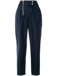 The Calvin Klein SS18 Ready-To-Wear collection levels the brand's efficiency with a sophisticated fashion edge. These navy silk blend hareem pants have an asymmetric style; they are fastened at the front via a line of silver tone and plain buttons, and they feature a silver tone zip to one side. With a clean cut and a relaxed shape, they perfectly endorse the minimalist aesthetic at the heart of the brand. Hareem Pants, Calvin Klein High Waisted, Sophisticated Fashion, Calvin Klein 205w39nyc, Sailor Pants, American Brand, Minimalist Aesthetic, Cropped Trousers, High Waisted Trousers