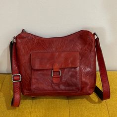 This Is Gorgeous Workmanship And Has A Pocket On The Front For Phone Etc., Also Has 2 Inserts Inside And Also A Zippered Pocket ..The Oxblood Color Is A Timeless And Classic Piece.. It Gets Better With Wear!! Red Leather Shoulder Bag With Leather Backing, Casual Red Soft Leather Satchel, Red Leather Shoulder Bag For Everyday Use, Red Shoulder Bag With Leather Backing For Everyday Use, Casual Red Leather Satchel, Red Leather-lined Shoulder Bag For Everyday, Red Vintage Shoulder Bag With Leather Lining, Vintage Red Soft Leather Bags, Vintage Red Shoulder Bag With Leather Lining