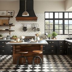 a black and white checkered floor in a kitchen with two stools next to the island