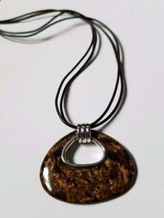 "SILPADA Bronze Age Bronzite Pendant Leather Necklace RETIRED Measurements - 18\" with a 2\" Extender Pendant Measuress approx. 1 3/4\" wide by 1 1/2\" tall Retired and No Longer available. Box not included." Cheap Bronze Necklaces With Antique Finish, Cheap Bronze Necklaces For Gifts, Brown Round Necklace With Lobster Clasp, Bronze Jewelry, Funky Jewelry, Jewelry Lookbook, Bronze Age, Spiritual Jewelry, Jewelry Inspo