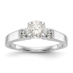 a white gold engagement ring with diamonds