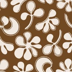 a brown and white flower pattern on fabric