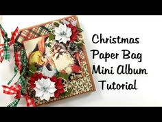 christmas paper bag mini album with ribbon and poinsettis on the front cover