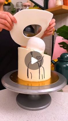 a person is cutting into a cake with a knife