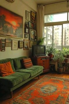 a living room filled with furniture and lots of pictures hanging on the wall above it