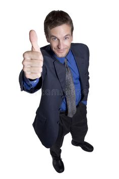 a man in a business suit giving the thumbs up sign royalty photos, images and stock photography