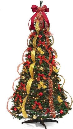 a decorated christmas tree with red and gold ribbons