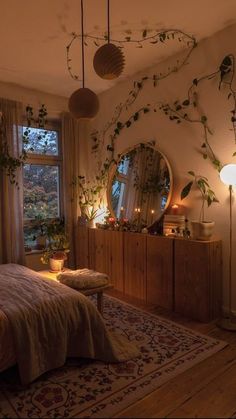 the bedroom is decorated with plants and lights