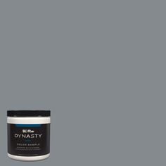 a can of dymasty paint on a grey background