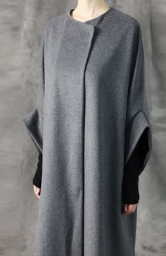 PLEASE KEEP IN MIND **Item takes up to 2 business weeks for production and 100% handmade ****-**Details Exclusively Ours!Oversized Overlong Wool Long Sleeve Minimalist Style Broad-based Cashmere Coat ShimmerProduct DescriptionFabric: 80% Wool %20 polyColor: gray (pictured) , black and redWashing:Wool fabric dry low ironSample size : Large / 1,68 height 58weight Fit True to Size - So pick up your actual size.:)--Attention: Overseas standard shipping normally takes around 15/26 bussines day---Note Minimalist Moda, Street Style Shop, Oversized Wool Coat, Fifties Fashion, Perfect Coat, Women Coat, Fashion Days, Oversized Coat, Spring Fashion Trends