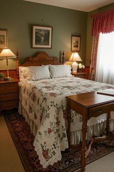 a bedroom with a large bed and two lamps on either side of the bed,