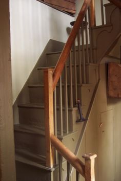 the stairs are made of wood and metal