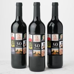 three bottles of wine with pictures on the front and back, all in different sizes