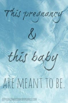 there is a blue sky with water and the words, this pregnant & this baby are meant to be