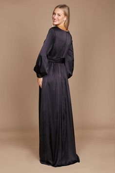 Are you trying to find the ideal long dress that will make you feel both gorgeous and at ease? Check out this gorgeous long-sleeved formal dress! It has a chic split a-line skirt that will accentuate your attractive legs, a trendy and elegant peplum-style bodice, and romantic long sleeves. Elegance, beauty, and comfort are personified in this outfit. Excellent for any special event! Fabric: Satin Length : Full Length Sleeve Style : Long Sleeve Color : Black, Navy Sizes : 8, 10, 12, 14, 16, 18, 2 Chic A-line Maxi Dress For Dinner, Solid Color A-line Long Sleeve Party Dress, Elegant Long Sleeve Floor-length Dress For Night Out, Elegant Long Sleeve Evening Dress For Night Out, Dressy Long Sleeve Evening Dress, Chic Long Sleeve Prom Dress, Elegant Full-length Evening Maxi Dress, Elegant Long Sleeve Maxi Dress For Night Out, Elegant Full Length Maxi Dress For Prom Season