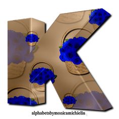 the letter k is decorated with blue flowers