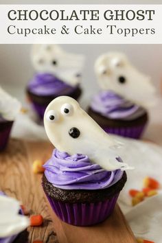 cupcakes decorated with purple frosting and spooky eyes