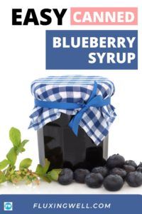 blueberry syrup in a jar with berries around it and the words easy canned blueberry syrup