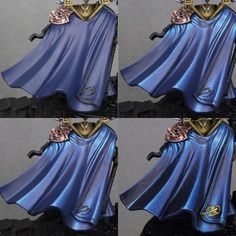 four pictures of a blue cloak with gold accents