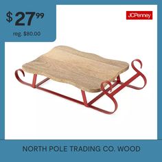 a wooden table sitting on top of a metal sled with the price $ 27 99