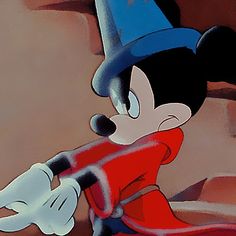 an animated mickey mouse with a red shirt and blue hat