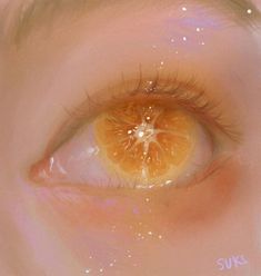 an orange slice is reflected in the eye of a child