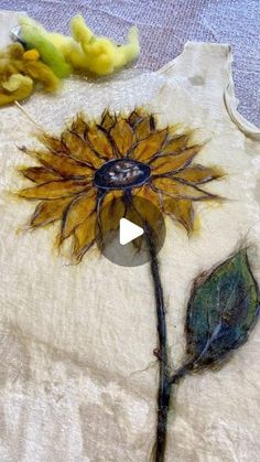 an image of a sunflower on a piece of paper